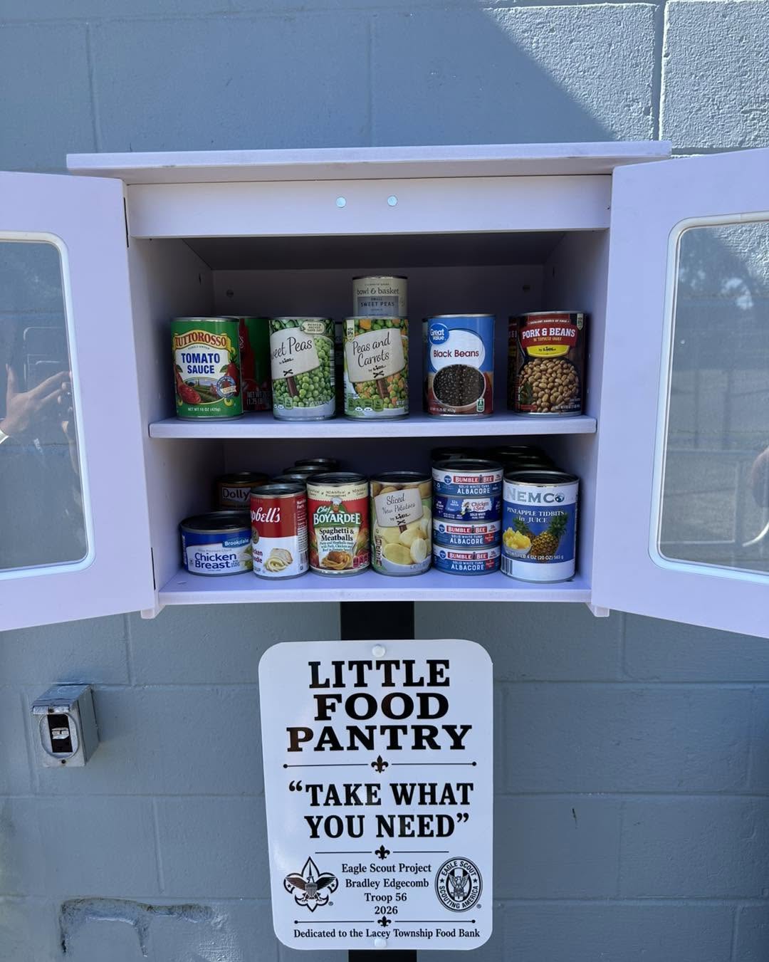 Little Food Pantry with canned food.