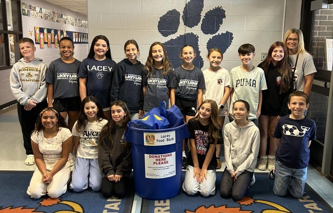 Peer Leadership students from Cedar Creek School with food donation for the lacey food bank